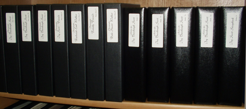 shelved binders containing archived documents